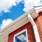 White Seamless Gutters Installed on a roof